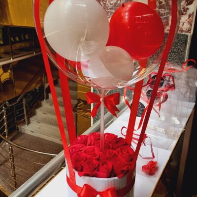 Beautiful balloon and flower bouquet combining elegant flowers with decorative balloons