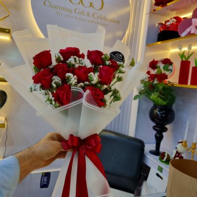 elegance and romance with this red flower bouquet with small white accents