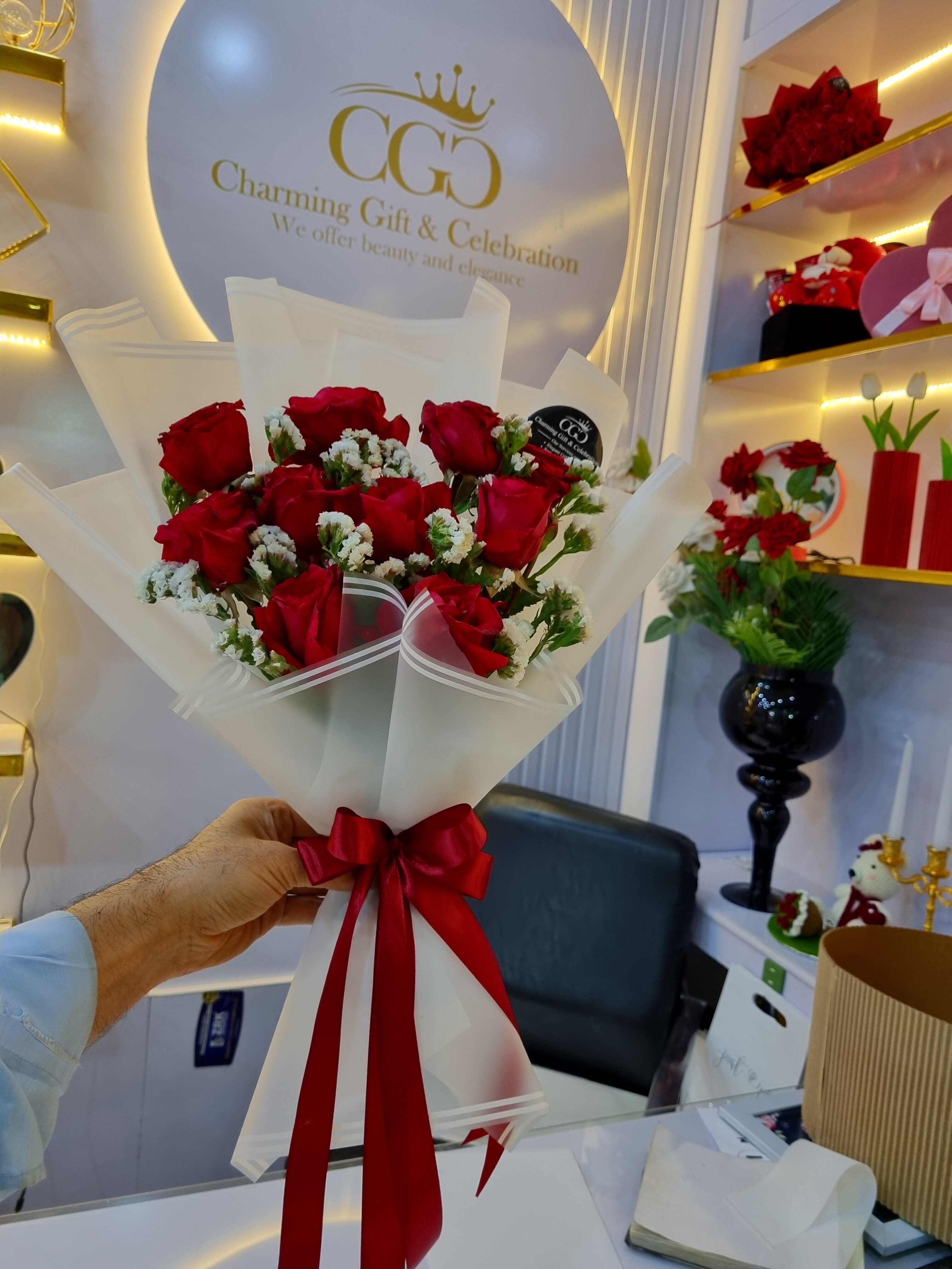elegance and romance with this red flower bouquet with small white accents